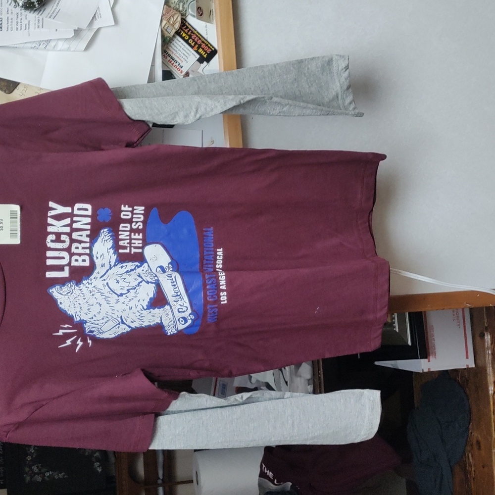 Boys size m lucky brand long sleeve shirt with a bear surfing on the front